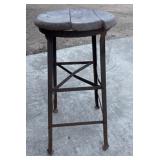 Vintage industrial metal and wood factory stool.