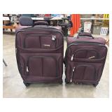2 Burgundy soft-side upright spinner luggage