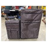 2 purple pink polka dot suitcases. Large suitcase