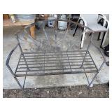 Rustic metal garden bench.