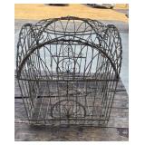 Ornate, vintage-style wirework birdcage featuring