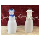 2 pc. frosted and clear glass snowman figurines.