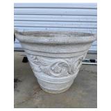 Classic weathered sandstone garden planter.