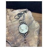 Vintage-style cameo pendant necklace.