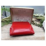 St. Thomas leather treasures pocket book.