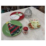 Christmas cookie plates and Santa candle and