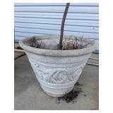 Ornate, weathered white cast-stone garden planter