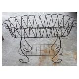 Rustic wrought iron plant stand and basket holder