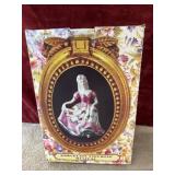 Vintage porcelain musical figurine.