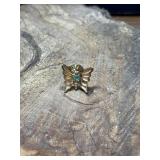 Vintage dainty 14k gold butterfly pin, featuring