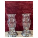 2 pc. weighted silver hurricane candle holders.