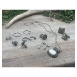 Vintage-style and sterling silver jewelry pieces.