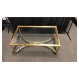 Glass top gold coffee table