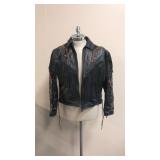 Black leather fringed motorcycle jacket
