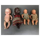 Vintage Painted Porcelain Jointed Baby Dolls