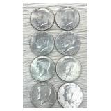 Lot of (8) Kennedy Half Dollars