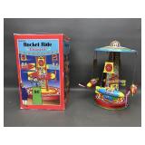 2000s Schylling Rocket Ride Tin Carousel