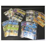 Collection Of Pokemon Cards In Plastic Sheeting