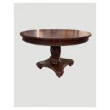 Round pedestal base dining table in cherry finish