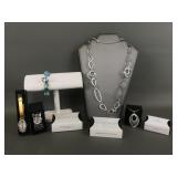Quartz silvertone Artisan leaf cuff watch & more