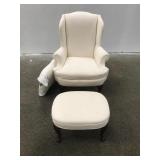 White cushion lounge chair with stool