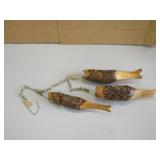 Fishing stringer with wooden fish decor