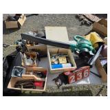 lots of random tools and hardware on the table