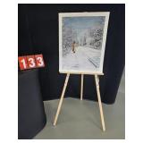 signed winter print and easle