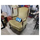 green wingback chair