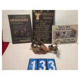 Hunting signs and deer bottle holder