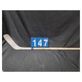signed olympic hockey stick 2002