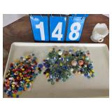marbles jar and cup full