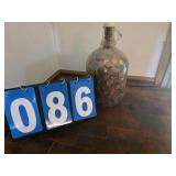 1 Gallon jar of pennies.