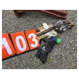golf clubs and bocce ball set