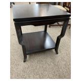 Dark Finish Wood Table with Styled Legs and Shelf