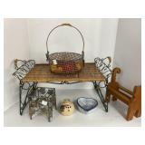 Wicker Bench, Metal Basket, and Decorative Items