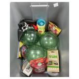 Bin of Pet Toys, Treats, and a flag
