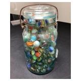 Glass Storage Jar Filled with Assorted Marbles