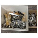Stainless Steel and Gold-Toned Flatware