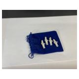 Four Glazed Porcelain Frozen Charlotte Figurines