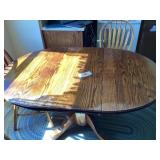 Oak kitchen table 42' x 60'. Leaf is 16' (