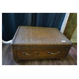Wicker coffee table, worn