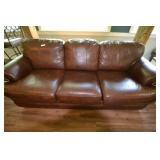 Brown leather couch, lightly worn