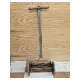 Antique Lawn Mower marked The Master Five