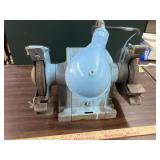 Bench grinder, runs