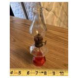 7" tall lamp, oil is red