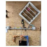 Louvre, squares, caulking guns on wall