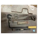 Tubing cutter, snips, wedge, pry bars