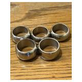 5 stainless rings, no markings