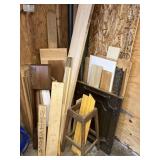 Lot of lumber & plywood in corner